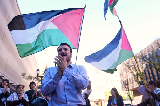 Palestinian activist Mahmoud Khalil meets with supporters outside Federal Court on Tuesday, Oct. 21, 2025 in Philadelphia (AP Photo/Matt Rourke)
