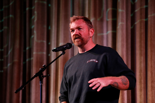 Democratic Maine Senate candidate Graham Platner speaks at a town hall in Ogunquit, Maine, Wednesday, Oct. 22, 2025. (AP Photo/Caleb Jones)
