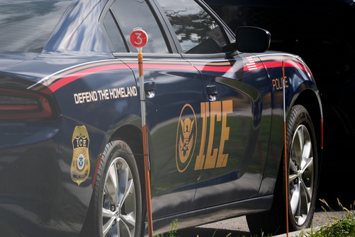 An Immigration and Customs Enforcement vehicle is parked outside the U.S. Immigration and Customs Enforcement (ICE) building Wednesday, Sept. 24, 2025, in Broadview, Ill. (AP Photo/Erin Hooley)