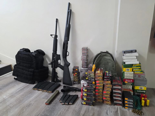 This undated photo provided by Clarke County Sheriff’s Department Oct. 29, 2025, shows weapons and ammunition removed from the home of an Alabama man following a search warrant. (Clarke County Sheriff’s Department via AP)