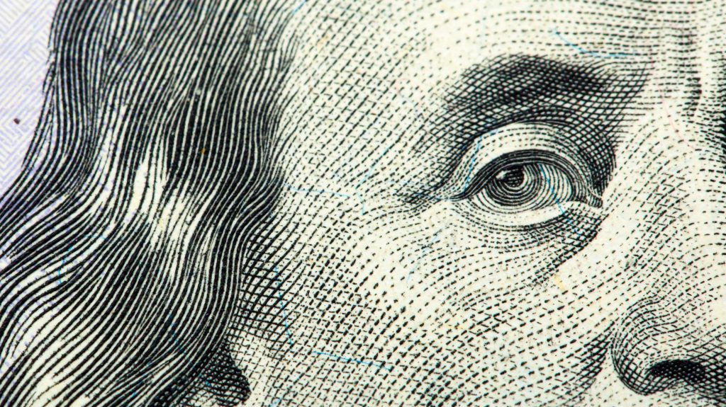 Hundred dollar bill close up. Beautiful original cash flow. One hundred bucks as a background on a long banner in high resolution.