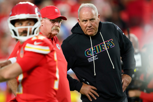 Kansas City Chiefs head coach Andy Reid, rear left, and special teams coordinator Dave Toub, right, confer during warmups before an NFL football game against the Detroit Lions, Sunday, Oct. 12, 2025 in Kansas City, Mo. (AP Photo/Reed Hoffmann, File)