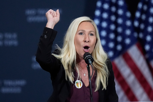 FILE - Rep. Marjorie Taylor Greene, R-Ga., speaks before Republican presidential nominee former President Donald Trump at a campaign event at the Cobb Energy Performing Arts Centre, Oct. 15, 2024, in Atlanta. (AP Photo/John Bazemore, File)