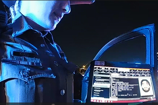 This image taken from video provided by Texas Department of Public Safety shows bodycam footage of law enforcement looking up information about Cowboys defensive end Marshawn Kneeland while searching for him, Nov. 5, 2025, in Frisco, Texas. (Texas Department of Public Safety via AP)