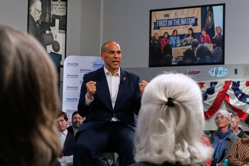 Sen. Cory Booker, D-N.J., addresses a gathering Friday, Nov. 14, 2025, in Manchester, N.H. (AP Photo/Charles Krupa)