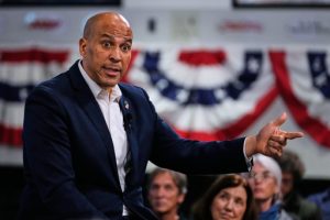 FILE - Sen. Cory Booker, D-N.J., addresses a gathering Nov. 14, 2025, in Manchester, N.H. (AP Photo/Charles Krupa)