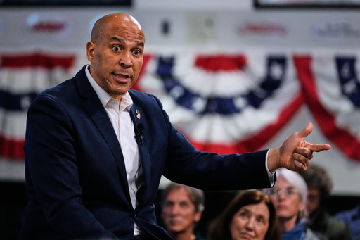 FILE - Sen. Cory Booker, D-N.J., addresses a gathering Nov. 14, 2025, in Manchester, N.H. (AP Photo/Charles Krupa)