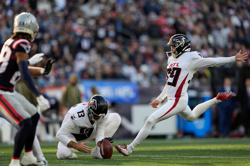 Atlanta Falcons place kicker Parker Romo (39) kicks a field goad against the New England Patriots during the second half of an NFL football game, Sunday, Nov. 2, 2025, in Foxborough, Mass. (AP Photo/Robert F. Bukaty)
