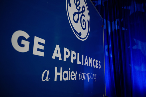FILE - A trailer with the GE logo is seen at a stage area at GE Appliances global headquarters, Aug 13, 2025, in Louisville, Ky. (AP Photo/Jon Cherry, file)