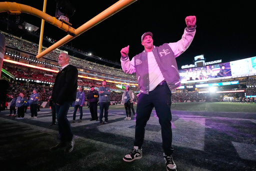Former NFL tight end Rob Gronkowski dances during halftime of an NFL football game between the New England Patriots and the New York Jets, Thursday, Nov. 13, 2025, in Foxborough, Mass. (AP Photo/Robert F. Bukaty)