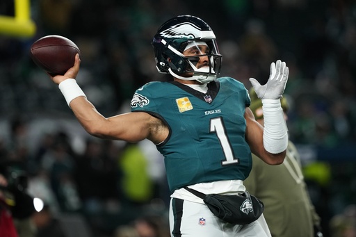 Philadelphia Eagles quarterback Jalen Hurts warms up before an NFL football game against the Detroit Lions on Sunday, Nov. 16, 2025, in Philadelphia. (AP Photo/Matt Slocum)