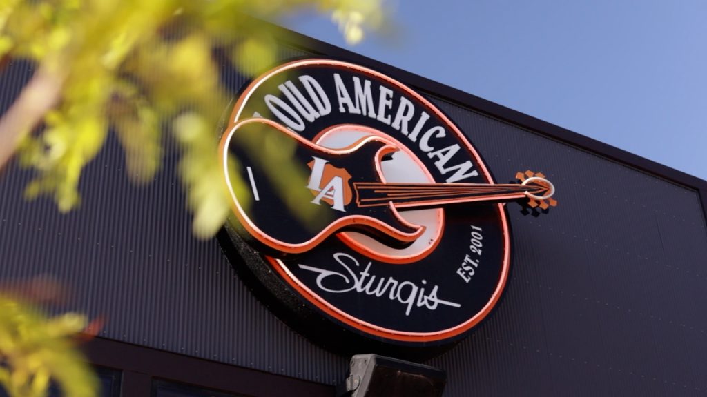 Loud American Sign with Leaves