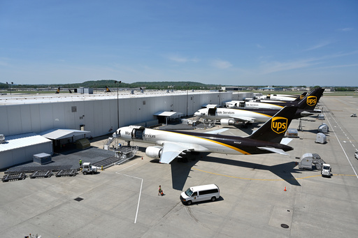 FILE - United Parcel Service transport jets wait to be loaded with packages at the UPS Worldport in Louisville, Ky., Apr. 27, 2021. (AP Photo/Timothy D. Easley, File)