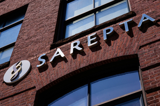 FILE - The name and logo of Sarepta Therapeutics is displayed on the company's headquarters, Monday, July 28, 2025, in Cambridge, Mass. (AP Photo/Charles Krupa, File)