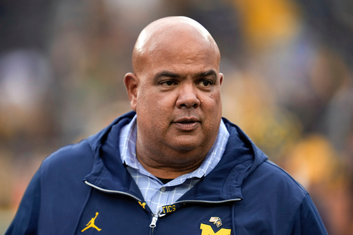 FILE - Michigan athletic director Warde Manuel watches in the second half of an NCAA college football game against UNLV in Ann Arbor, Mich., Sept. 9, 2023. (AP Photo/Paul Sancya, File)