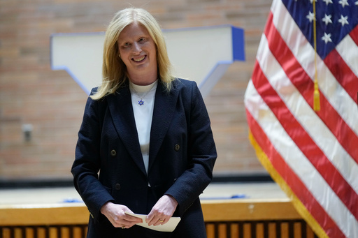 FILE - NYPD Commissioner Jessica Tisch steps off the stage after speaking during her swearing in ceremony at police headquarters in New York, Nov. 25, 2024. (AP Photo/Seth Wenig, file)