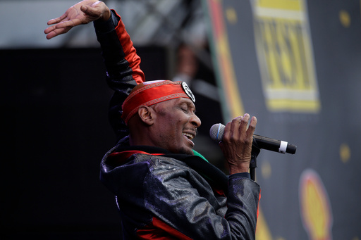 FILE - Jimmy Cliff performs at the New Orleans Jazz and Heritage Festival in New Orleans, Friday, May 3, 2013. (AP Photo/Gerald Herbert, File)