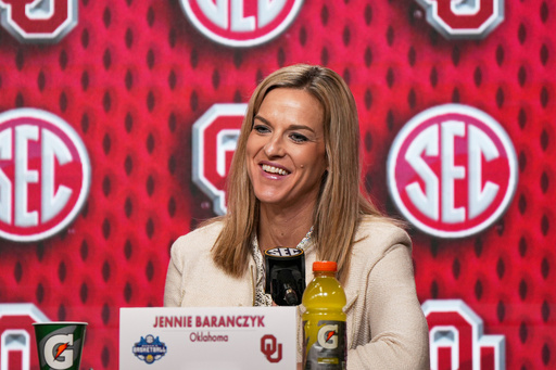 FILE - Oklahoma head coach Jennie Baranczyk answers questions during a press conference following an NCAA college basketball game against Kentucky in the quarterfinals of the Southeastern Conference tournament, March 7, 2025, in Greenville, S.C. (AP Photo/David Yeazell, File)