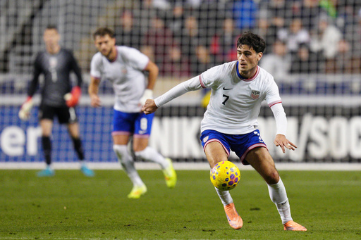 United States' Gio Reyna controls the ball during the second half of an international friendly soccer match against Paraguay, Saturday, Nov. 15, 2025, in Chester, Pa. (AP Photo/Derik Hamilton)
