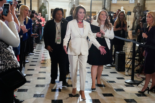 FILE - House Speaker Nancy Pelosi, D-Calif., arrives to listen to President Donald Trump deliver his State of the Union address to a joint session of Congress on Capitol Hill in Washington, Feb. 5, 2019. (AP Photo/Carolyn Kaster, File)