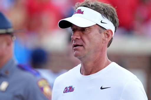 Mississippi head coach Lane Kiffin leave the field following an NCAA college football game against The Citadel, Saturday, Nov. 8, 2025, in Oxford, Miss. (AP Photo/Rogelio V. Solis)