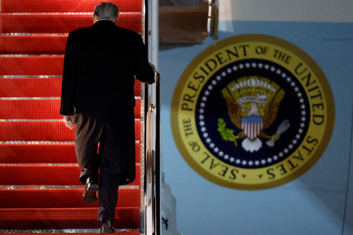 President Donald Trump walks up the stairs of Air Force One as he boards upon his arrival at Joint Base Andrews, Md., Friday, Nov. 7, 2025, en route to his Mar-a-Lago estate in Palm Beach, Fla. (AP Photo/Luis M. Alvarez)