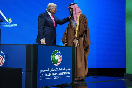 President Donald Trump speaks with Saudi Arabia's Crown Prince Mohammed bin Salman during the Saudi Investment Forum at the Kennedy Center, Wednesday, Nov. 19, 2025, in Washington. (AP Photo/Evan Vucci)