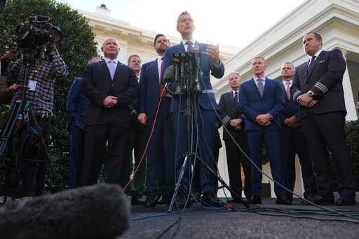 Transportation Secretary Sean Duffy speaks to the media alongside Sean O'Brien, President of the International Brotherhood of Teamsters, from left, Chris Sununu, president & CEO of Airlines for America, Vice President JD Vance and aviation industry representatives, about the impact of the government shutdown on the aviation industry, outside of the West Wing of the White House, Thursday, Oct. 30, 2025, in Washington. (AP Photo/Jacquelyn Martin)